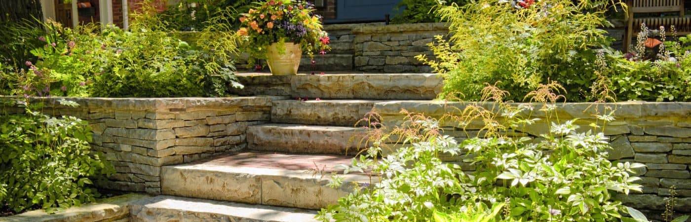 Landscaped Garden With Flowers And Retaining Walls